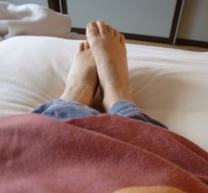 Sticking feet out of bed